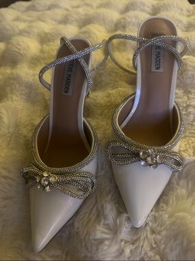Steve Madden White Pointed-Toe Heels with Rhinestone Bow Accents